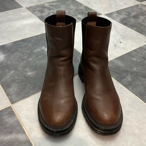 Pull-on lug sole Chelsea boots